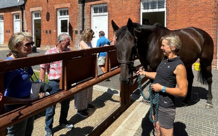 Visitors in the Rothschild Yard at the National Horseracing Museum in Newmarket
