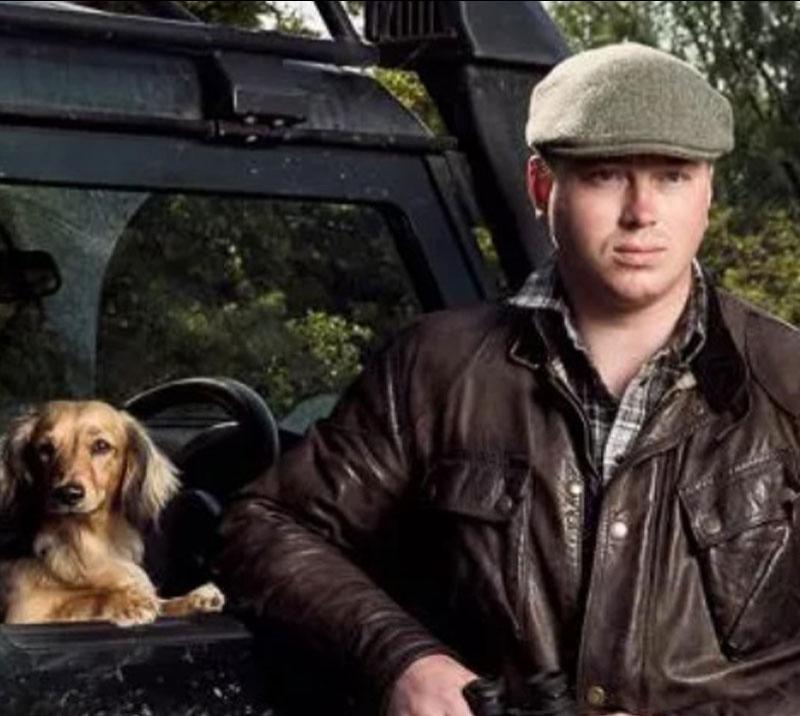 Horse trainer Scott Dixon with his dog.