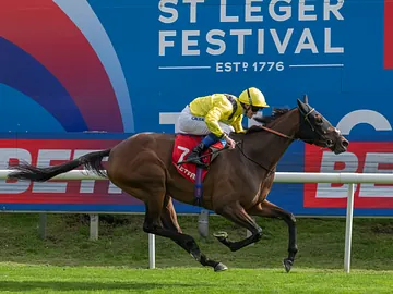 Waardah winning the Park Hill Stakes on St Leger Ladies Day